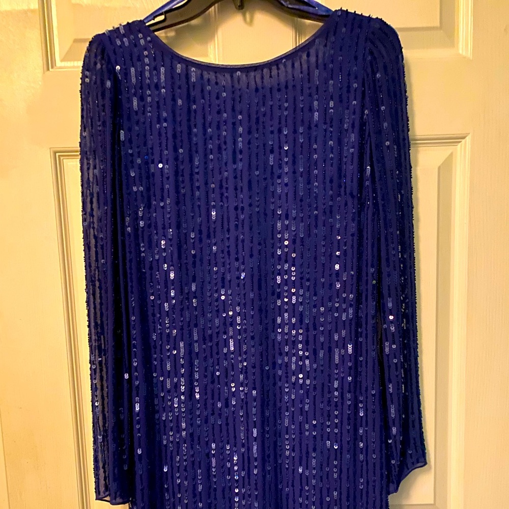 Stunning blue sequin backless perfect to celebrate anything!